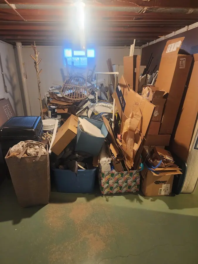 Roll-off dumpster container at job site for Roll Off Dumpster Rental in Fort Lee